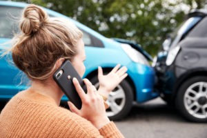 woman-on-phone-after-car-accident